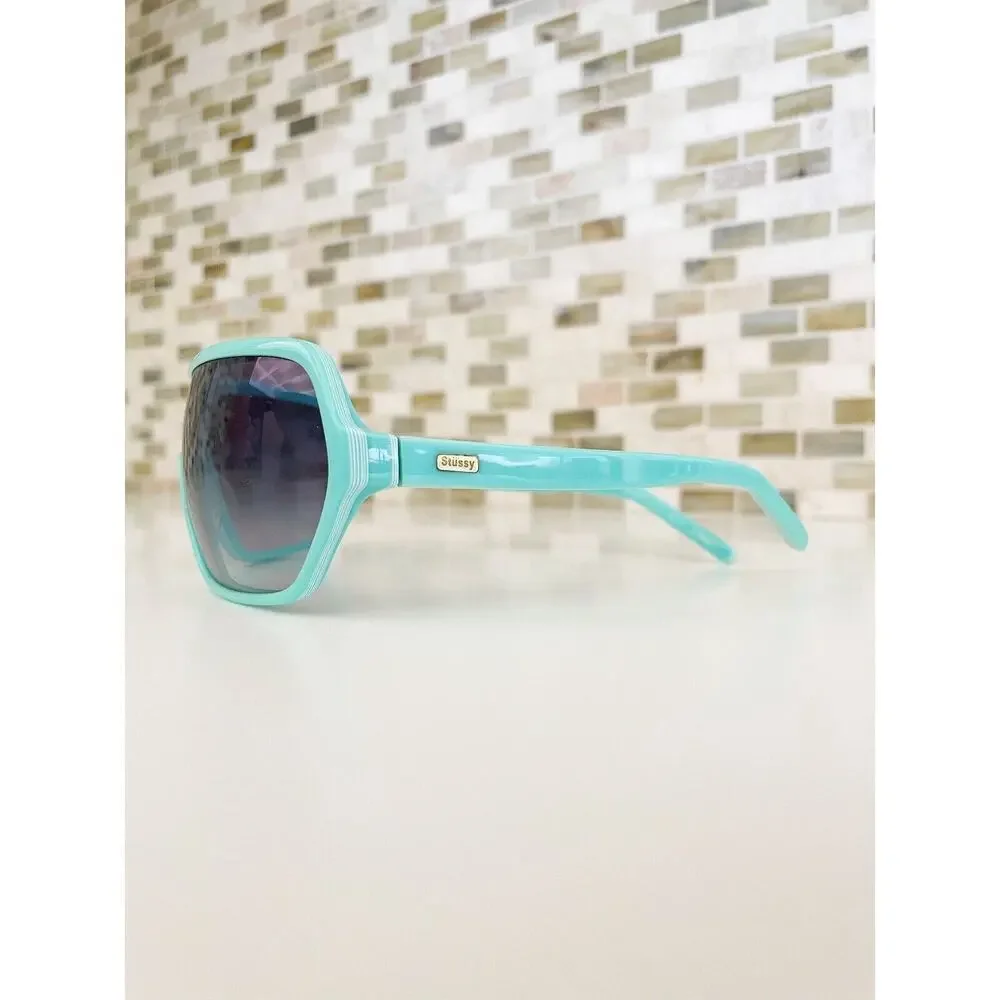 Stussy Mint Green Shield Sunglasses with Gradient Smoke Lenses